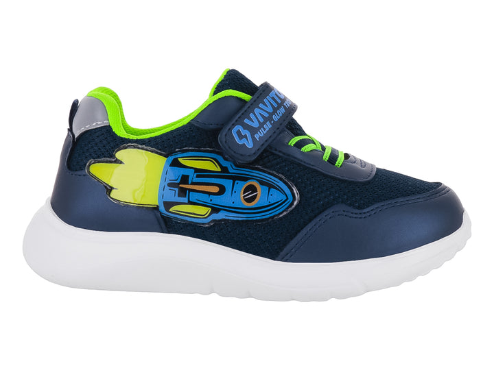Tenis deportivos infantiles color azul marino con suela blanca y un gráfico de cohete en el costado.