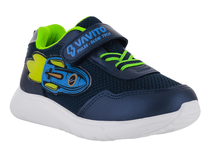 Tenis deportivos infantiles color azul marino con suela blanca y un gráfico de cohete en el costado.