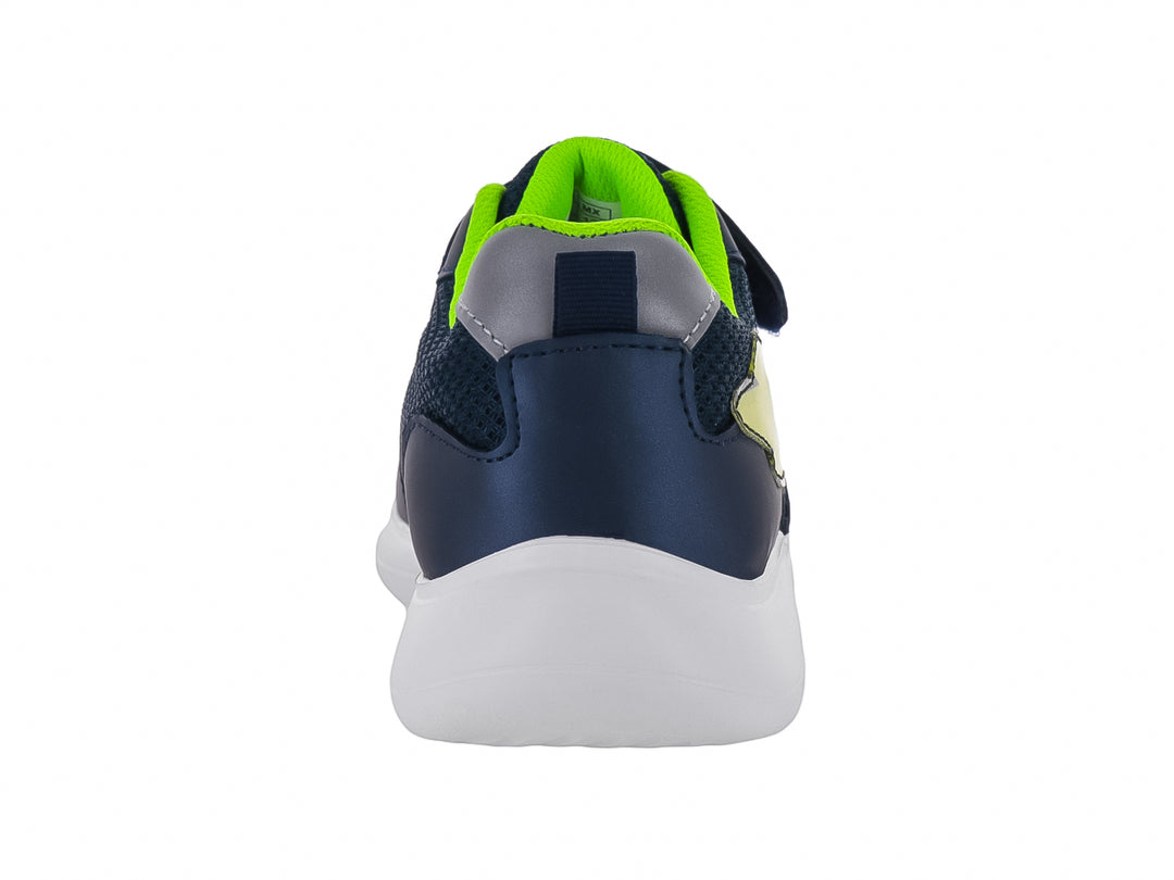 Tenis deportivos infantiles color azul marino con suela blanca y un gráfico de cohete en el costado.