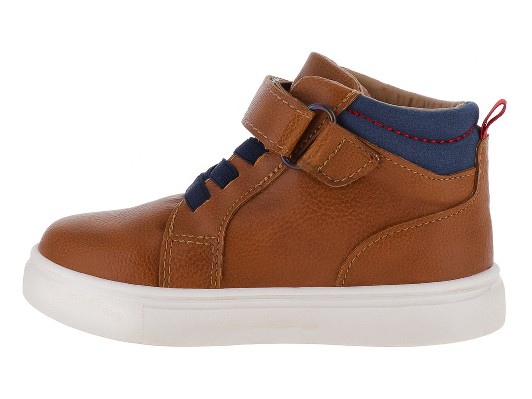 Zapato infantil VAVITO color cognac con detalles en azul, cierre de velcro y suela blanca.
