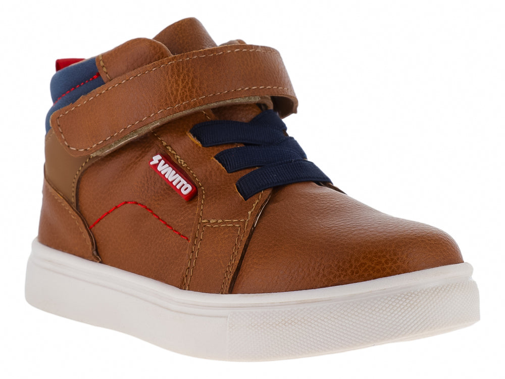 Zapato infantil VAVITO color cognac con suela blanca, detalles en azul y cierre de correa ajustable.