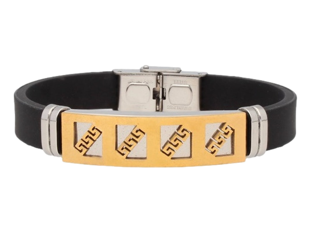 Pulsera de banda negra con placa central dorada y detalles en plata, cierre metálico ajustable.