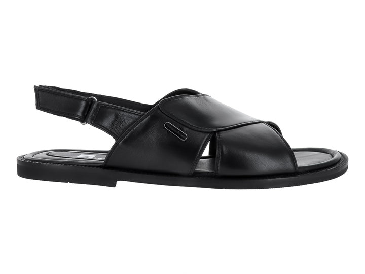 Sandalia de cuero color negro para hombre con correa ajustable en el talón y diseño casual.