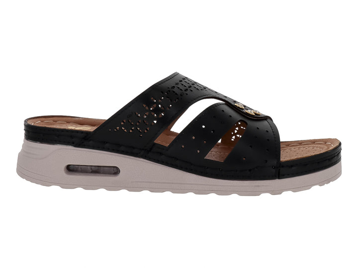 Sandalia Flexmas color negro con suela blanca amortiguada y detalles perforados en la parte superior.