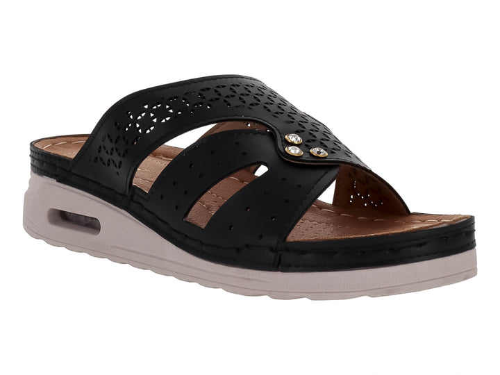 Sandalia Flexmas color negro con suela blanca amortiguada y detalles perforados en la parte superior.