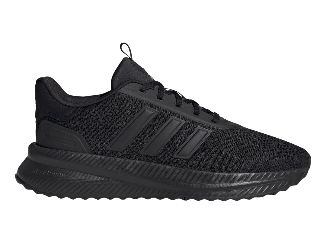 Tenis deportivos Adidas en color negro total, vista lateral.