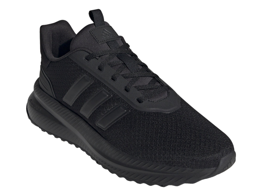 Tenis deportivos Adidas en color negro total, vista lateral.