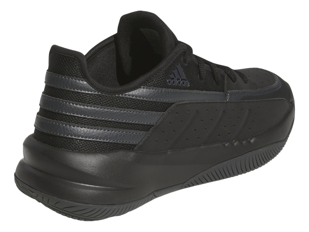 Tenis deportivos Adidas color negro con suela plana y detalles en textil.