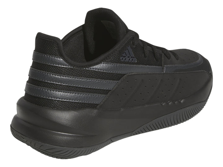Tenis deportivos Adidas color negro con suela plana y detalles en textil.