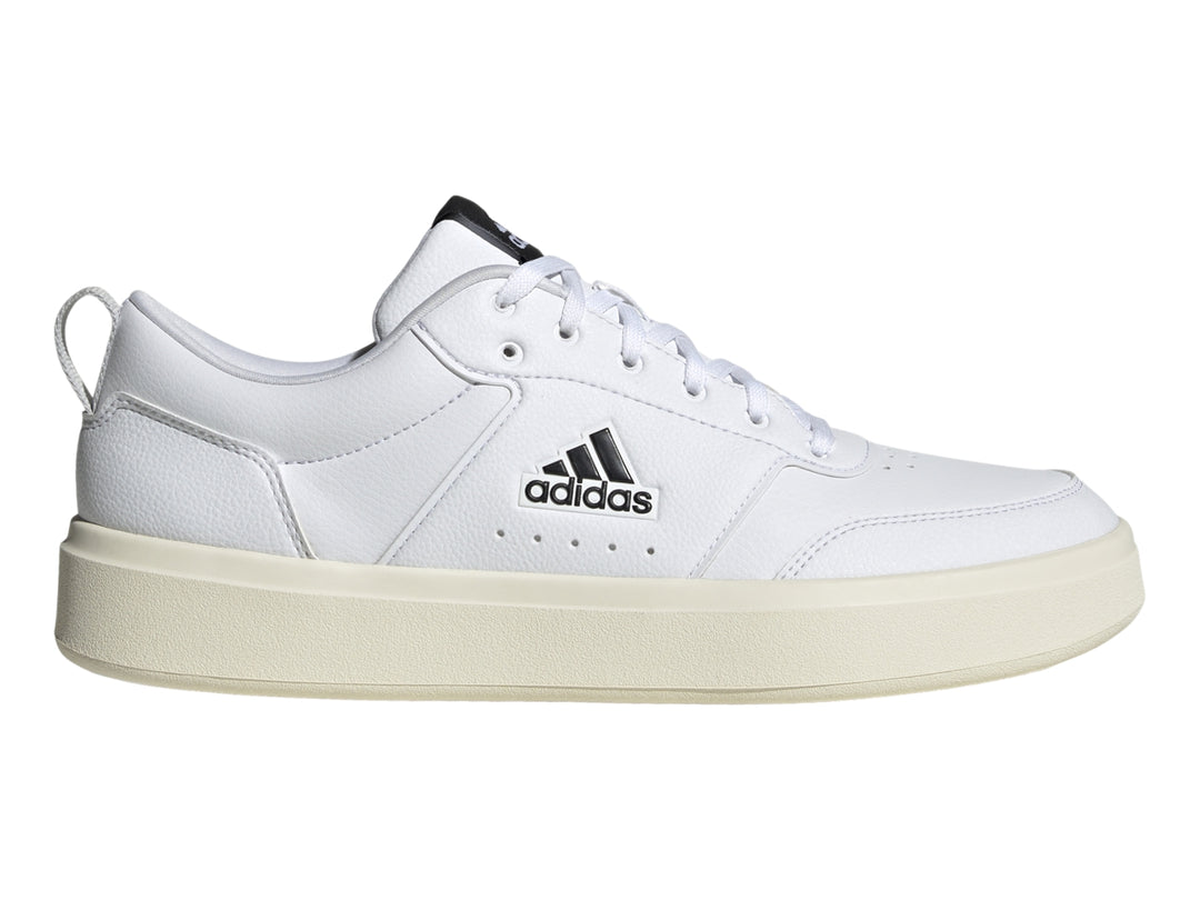 Tenis Adidas Park ST color blanco con suela off-white y logotipo negro lateral.