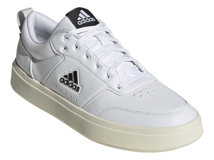 Tenis Adidas Park ST color blanco con suela off-white y logotipo negro lateral.