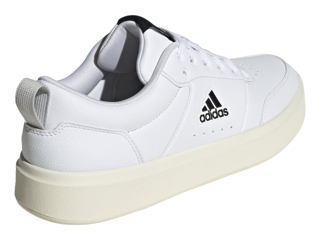 Tenis Adidas Park ST color blanco con suela off-white y logotipo negro lateral.