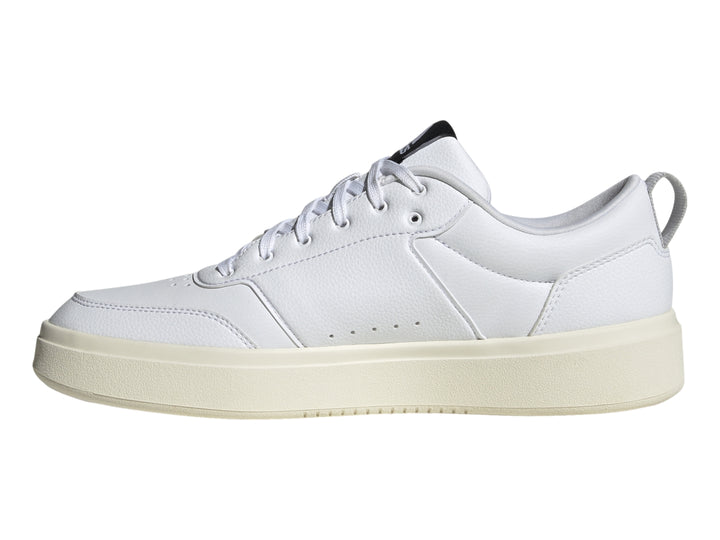 Tenis Adidas Park ST color blanco con suela off-white y logotipo negro lateral.