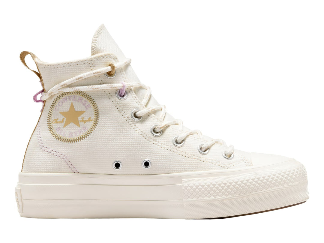 Tenis Converse Chuck Taylor All Star Lift Platform en color blanco hueso con suela de plataforma elevada.