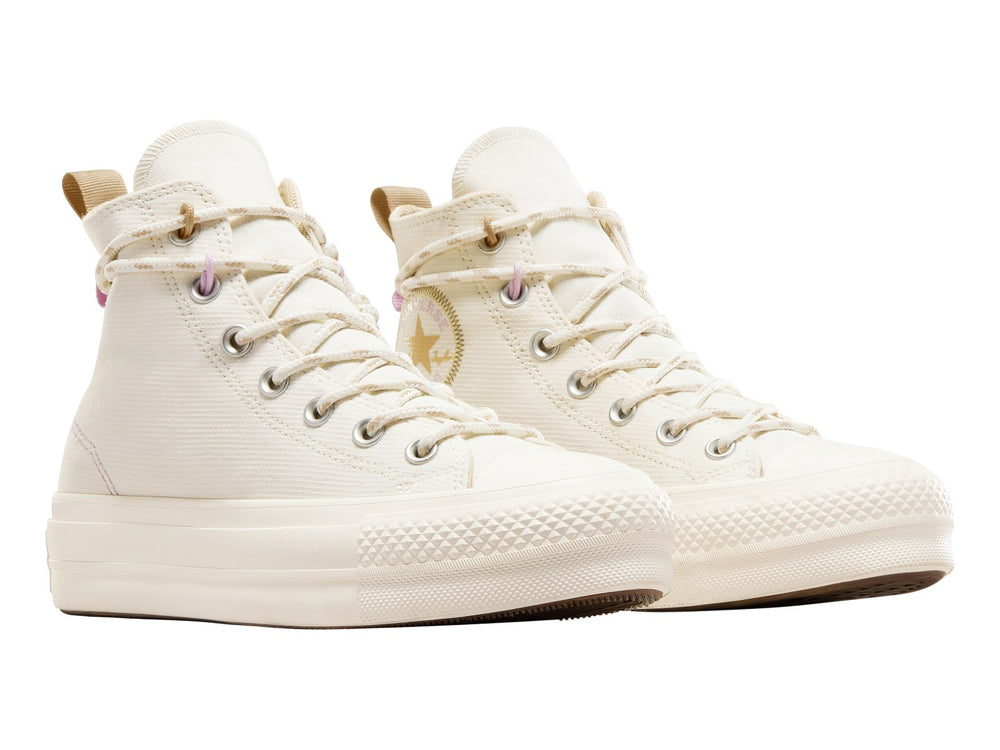 Tenis Converse Chuck Taylor All Star Lift Platform en color blanco hueso con suela de plataforma elevada.
