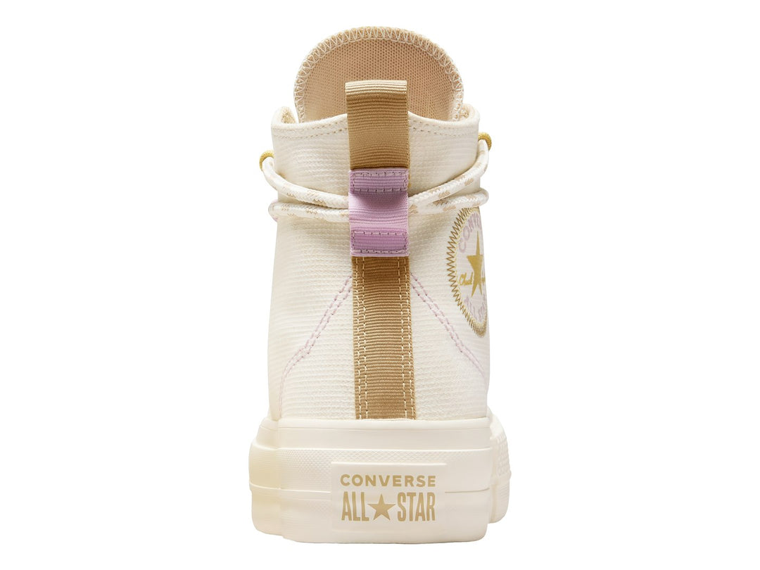 Tenis Converse Chuck Taylor All Star Lift Platform en color blanco hueso con suela de plataforma elevada.