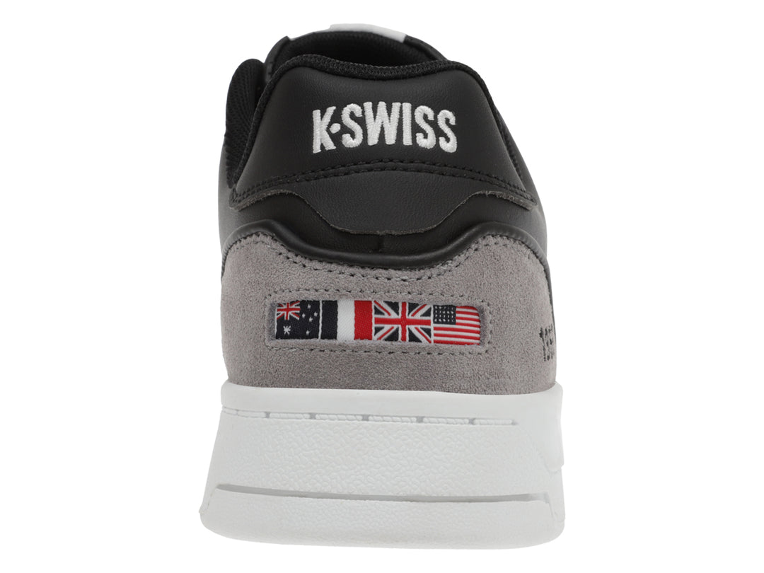 Tenis K-Swiss color negro con suela blanca y detalles en gris.