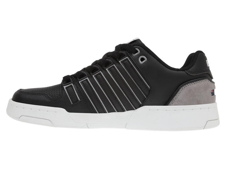 Tenis K-Swiss color negro con suela blanca y detalles en gris.