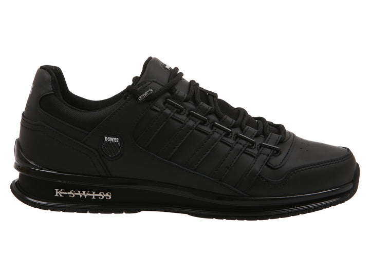 Tenis deportivos K-Swiss en color negro con suela negra y detalles plateados.