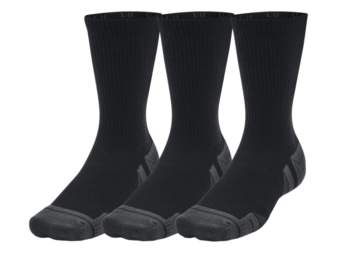Paquete de tres pares de calcetines deportivos Under Armour color negro con refuerzos en gris oscuro.