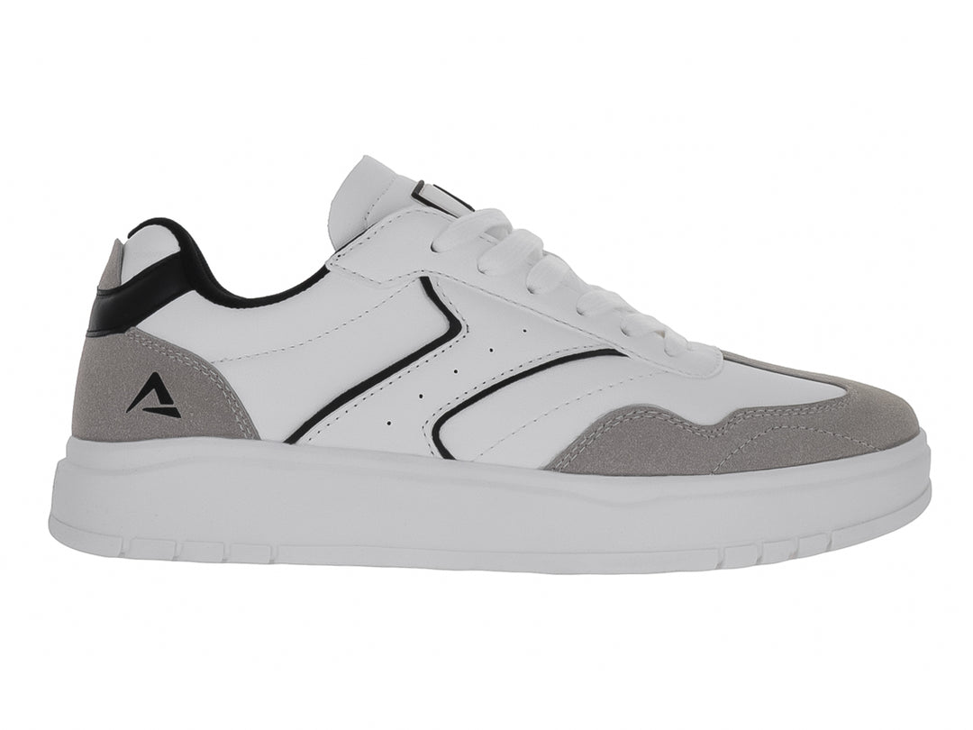 Tenis blancos con detalles en gris y negro y suela blanca ancha.