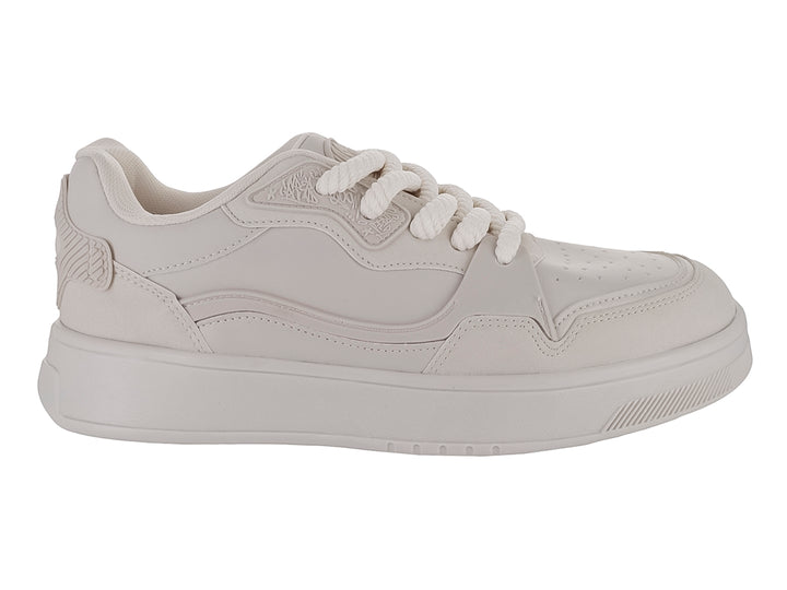Tenis casuales Clasben color latte con suela ancha y cordones a juego para niño.