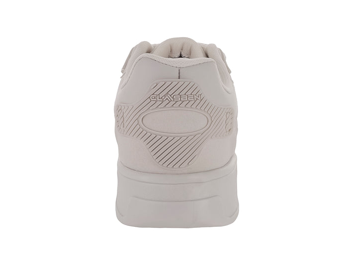 Tenis casuales Clasben color latte con suela ancha y cordones a juego para niño.