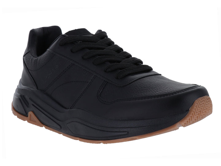 Tenis deportivos Clasben Byron en color negro con suela marrón, diseño moderno y cierre de cordones.