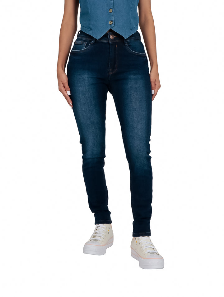 Pantalones jeans skinny de cintura alta en color azul stone wash para mujer.