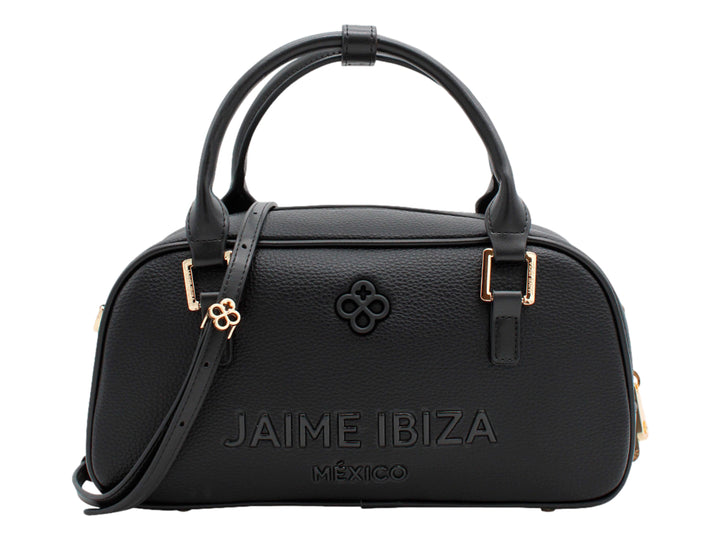 Bolso negro de Jaime Ibiza con forma cilíndrica, detalles dorados y correa ajustable.