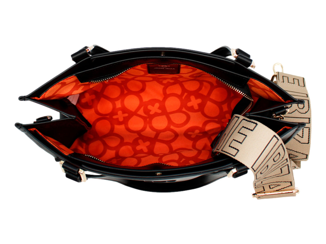 Bolso de hombro Jaime Ibiza color negro con asas largas, correa ajustable y detalles en metal dorado.