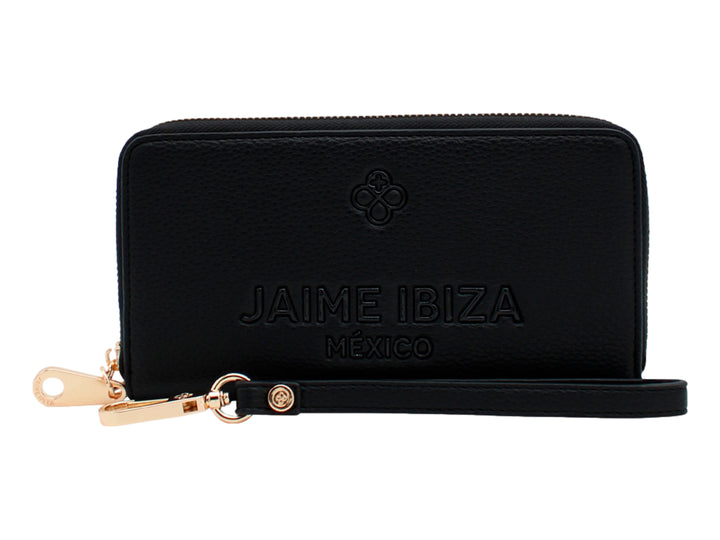 Cartera negra de Jaime Ibiza con correa de mano y herrajes dorados.