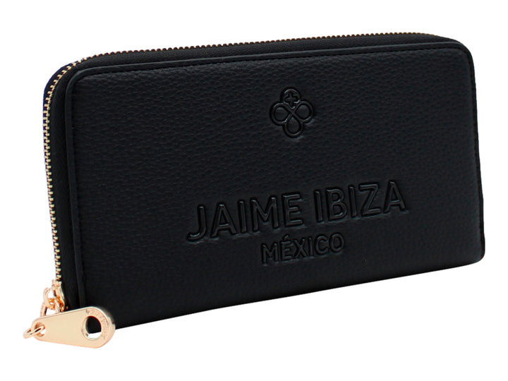 Cartera negra de Jaime Ibiza con correa de mano y herrajes dorados.