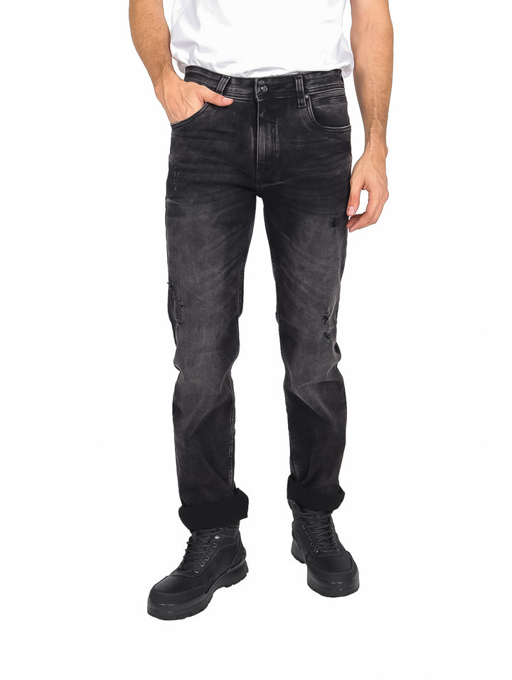 Pantalones jeans color negro desgastado para hombre.