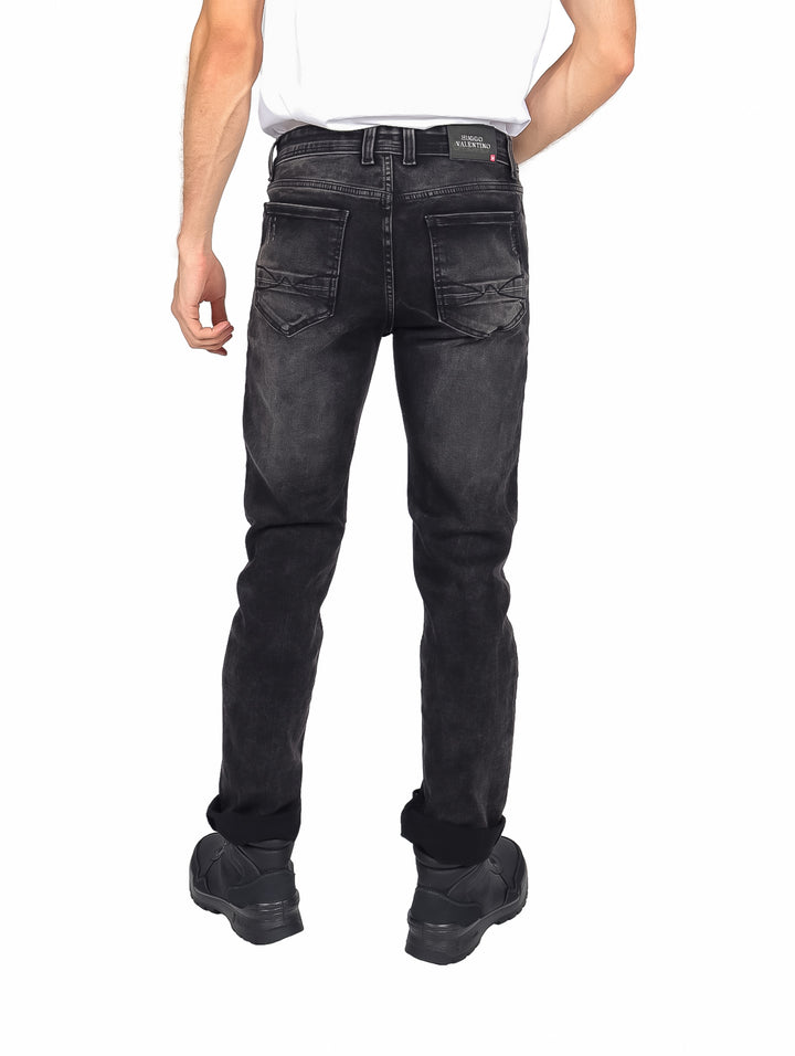 Pantalones jeans color negro desgastado para hombre.