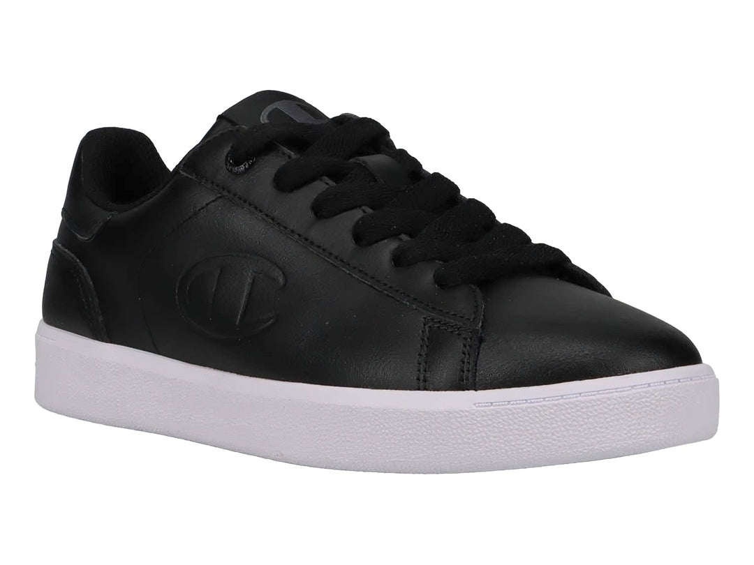 Tenis Champion para niños en color negro con suela blanca y cierre de cordones.