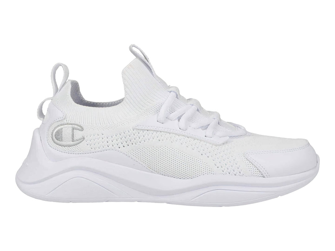 Tenis deportivos Champion color blanco con suela gruesa y tejido transpirable.