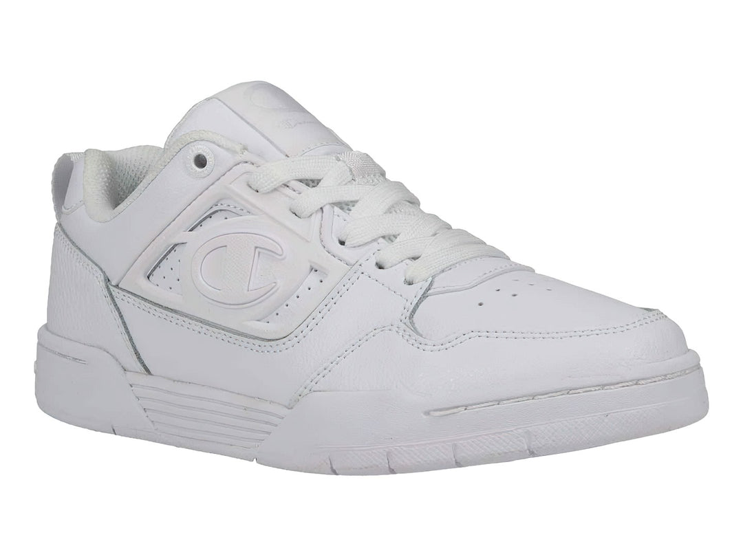 Tenis deportivos Champion color blanco total, diseño de corte bajo con logotipo en el lateral y suela robusta.
