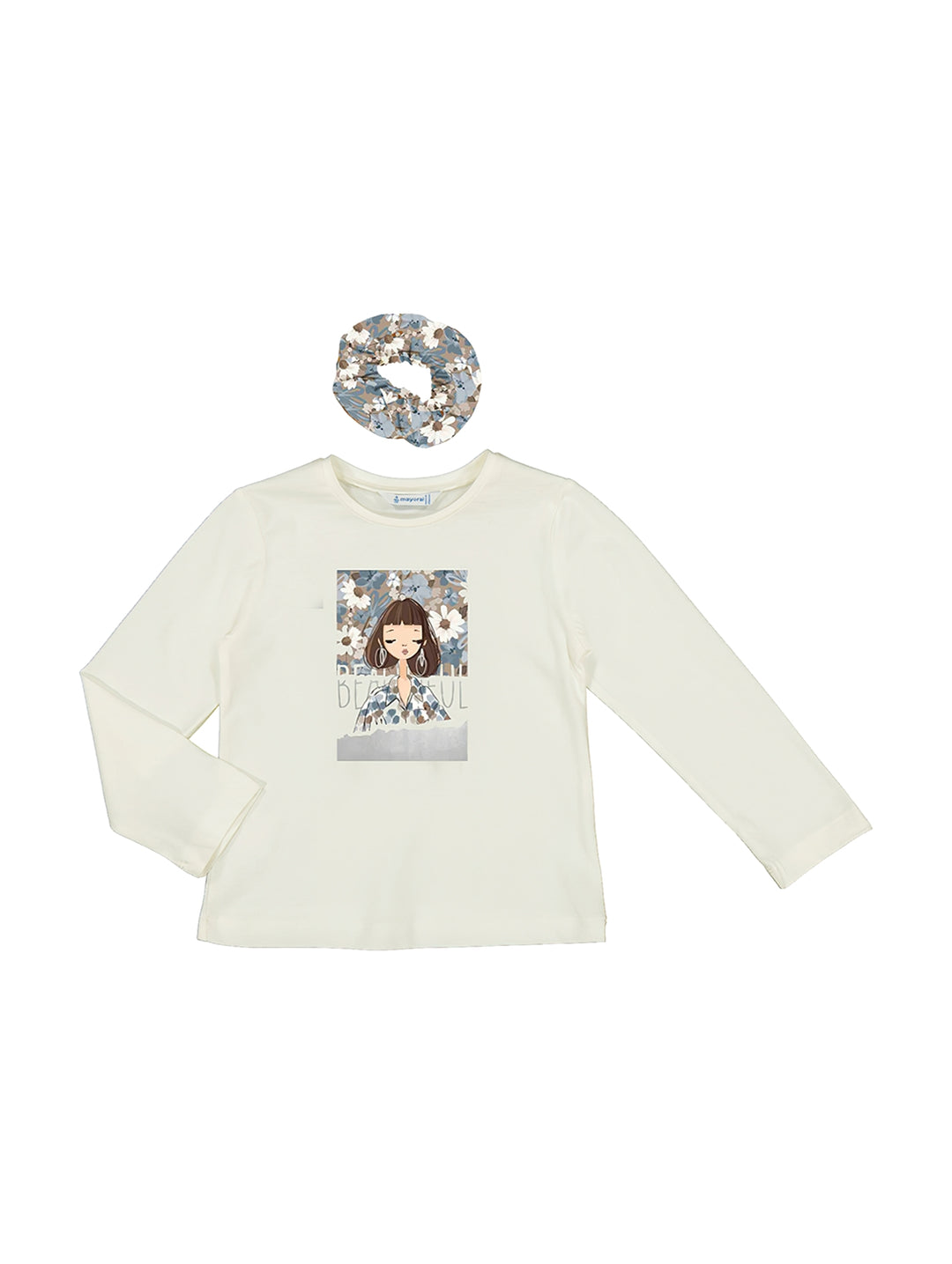 Set de camiseta manga larga color crudo con estampado frontal y coletero a juego en tonos celeste y azul para niña.