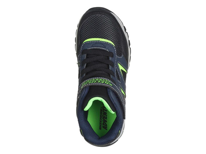 Tenis deportivos Skechers infantiles color azul marino con detalles verde lima y suela gris.