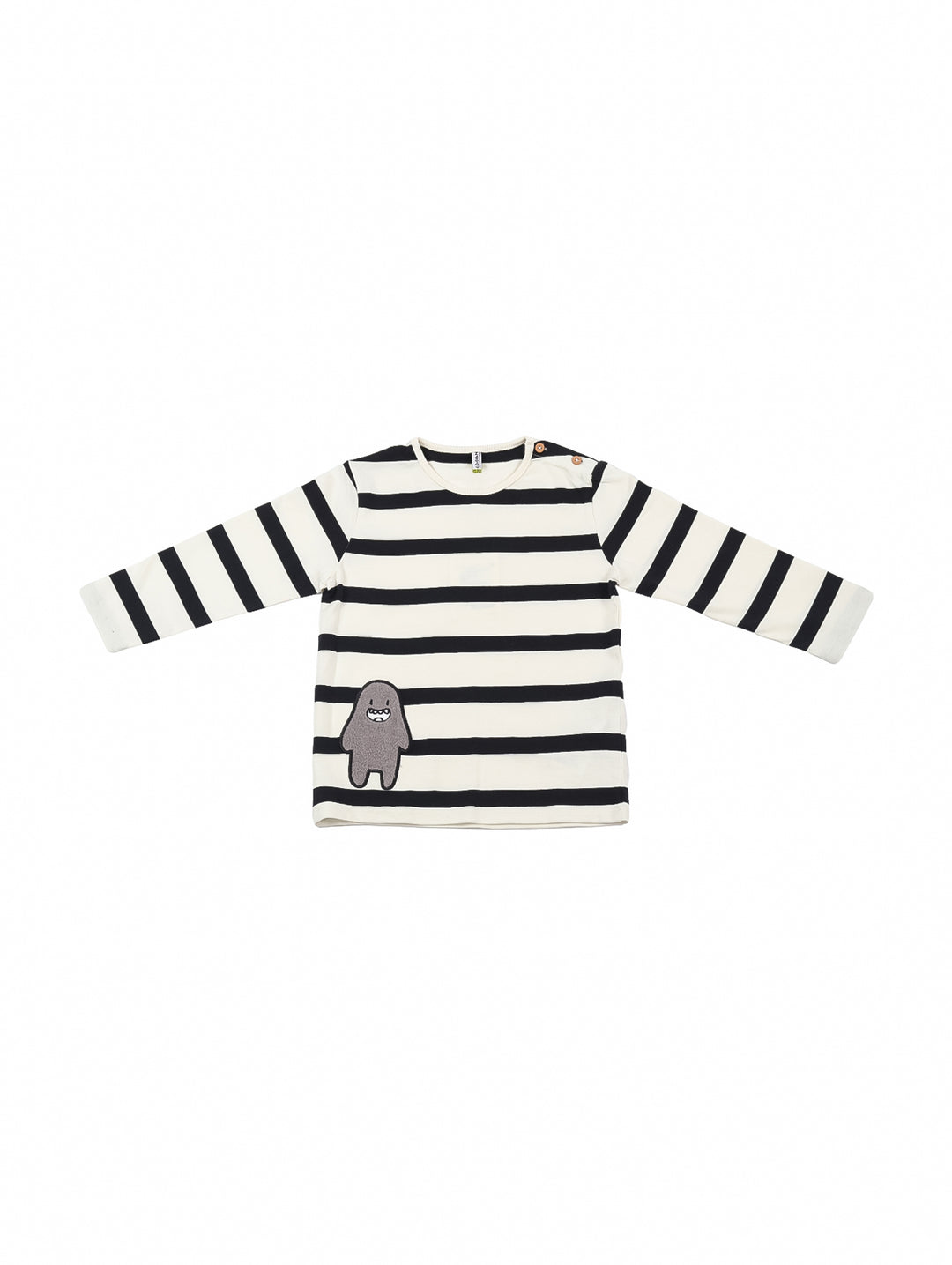 Playera de manga larga para niño en color crudo con rayas negras y un pequeño personaje bordado.