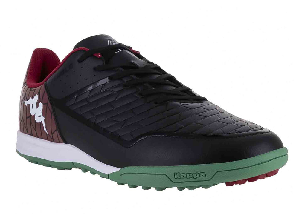 Zapato de fútbol Kappa en color negro con degradado morado en el talón y suela verde y blanca.