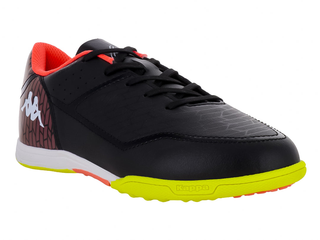Zapato de fútbol Kappa negro con suela verde neón y detalles degradados en el talón.