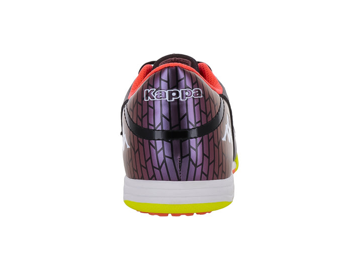 Zapato de fútbol Kappa negro con suela verde neón y detalles degradados en el talón.