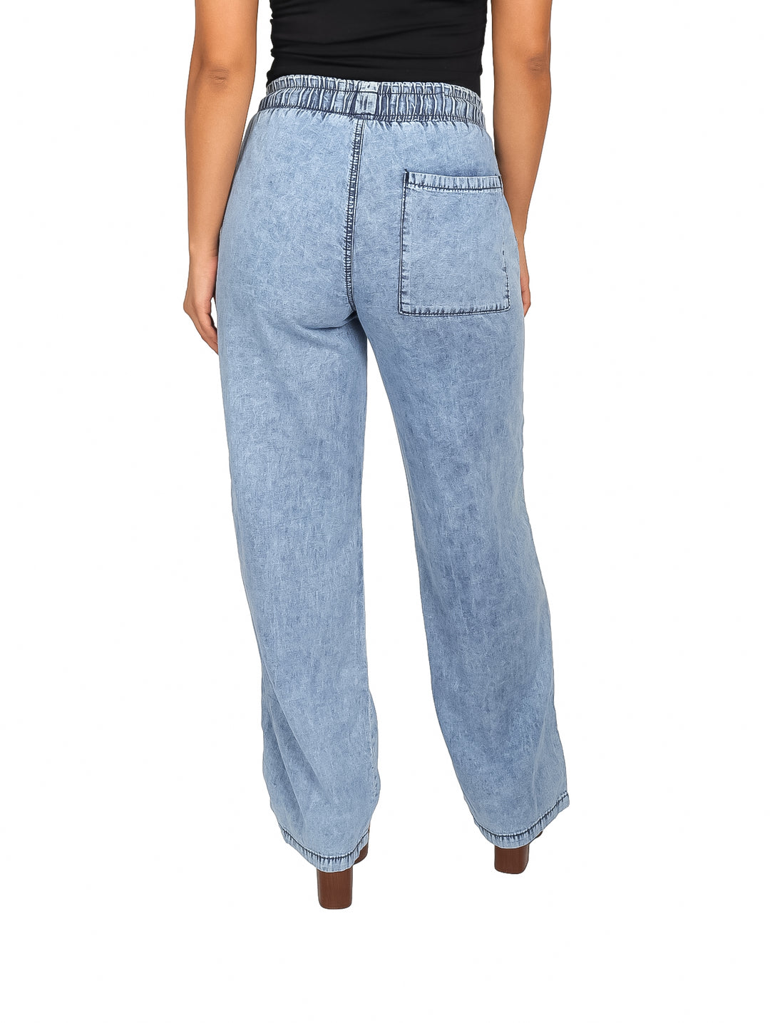 Pantalones tipo jogger rectos en color azul doble stone con cintura elástica y cordón negro para mujer.