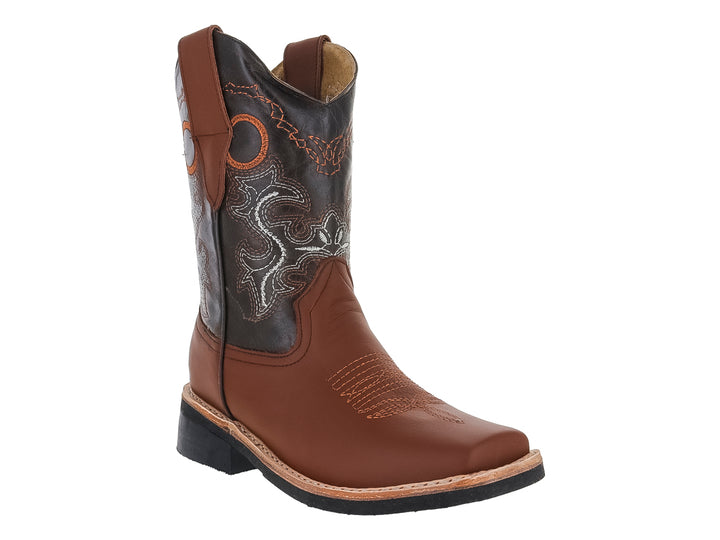 Botas vaqueras para niño en piel color marrón y negro con detalles bordados y punta cuadrada.
