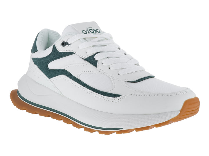 Tenis blancos con detalles en verde y suela de goma marrón.