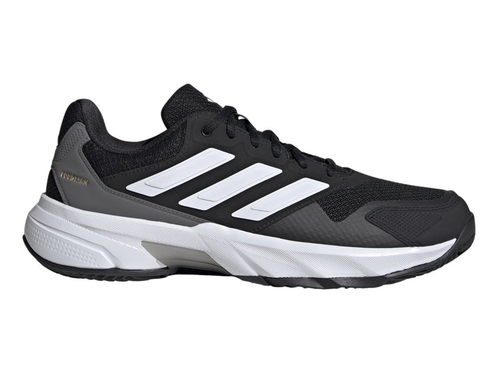 Tenis deportivos Adidas CourtJam Control 3 en colores negro, blanco y gris con suela blanca.