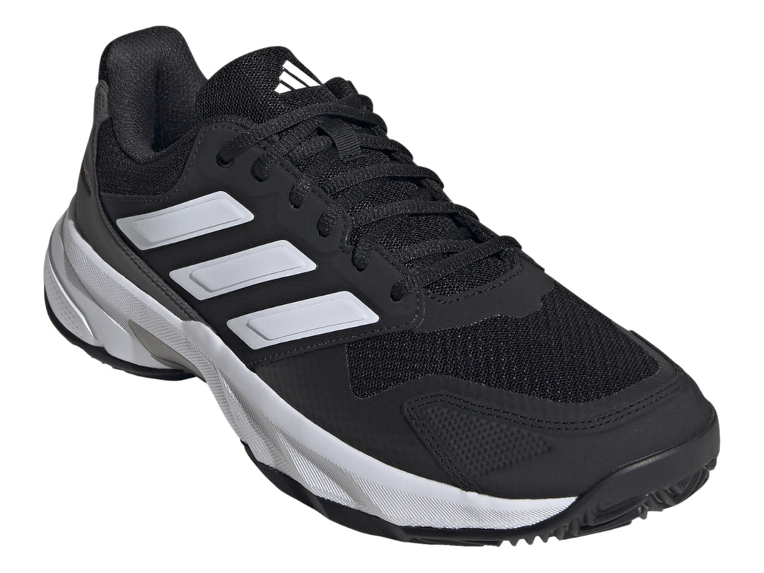 Tenis deportivos Adidas CourtJam Control 3 en colores negro, blanco y gris con suela blanca.