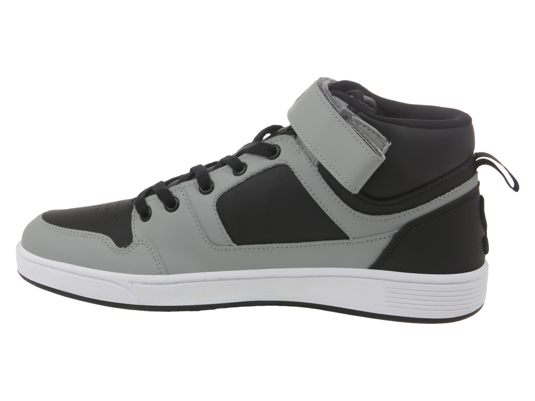 Tenis K-Swiss Urban Court de corte alto en colores gris y negro con suela blanca.